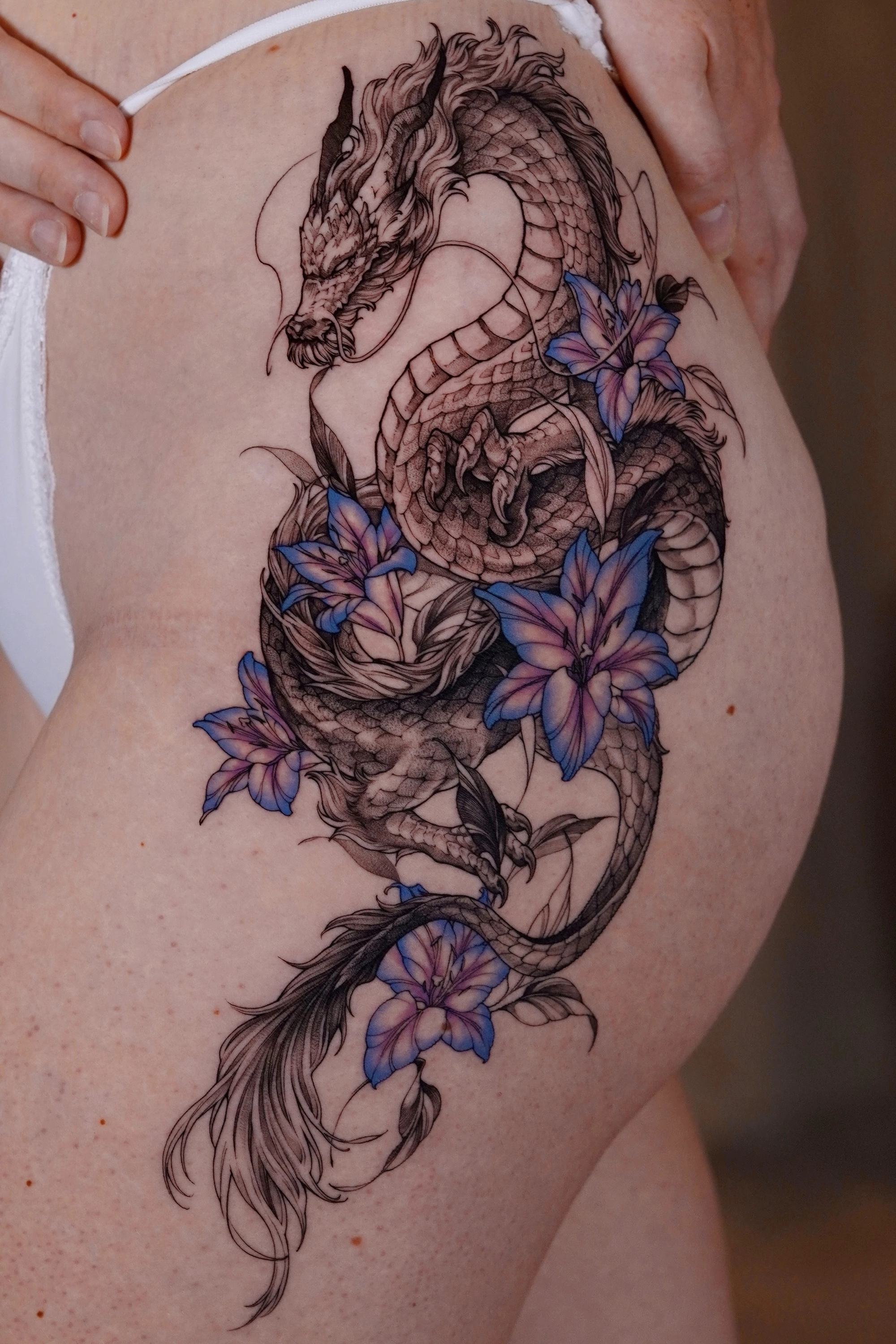 1768814804-1768812838-fine-line-dragon-on-thigh-for-women-tattoo-1jpg-fotor-20260119162132
